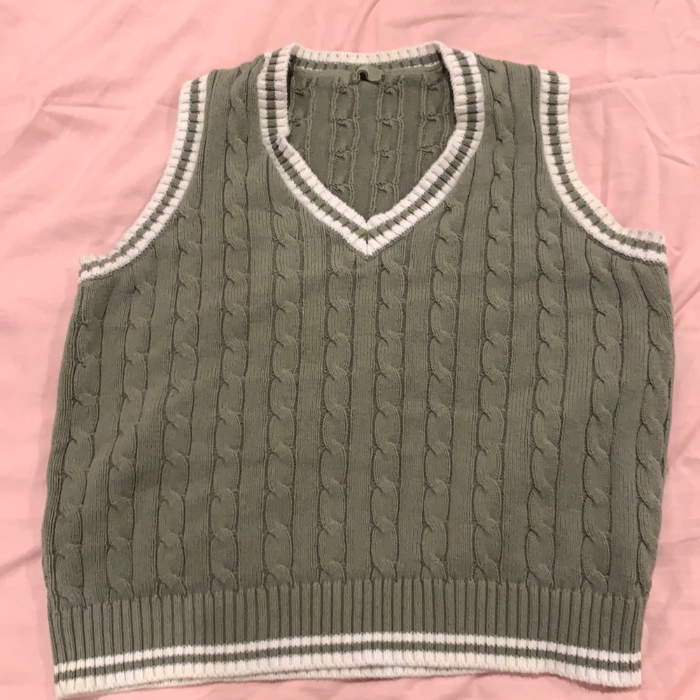 John galt sweater vest. Cute summer or winter basic, no problems just don’t wear